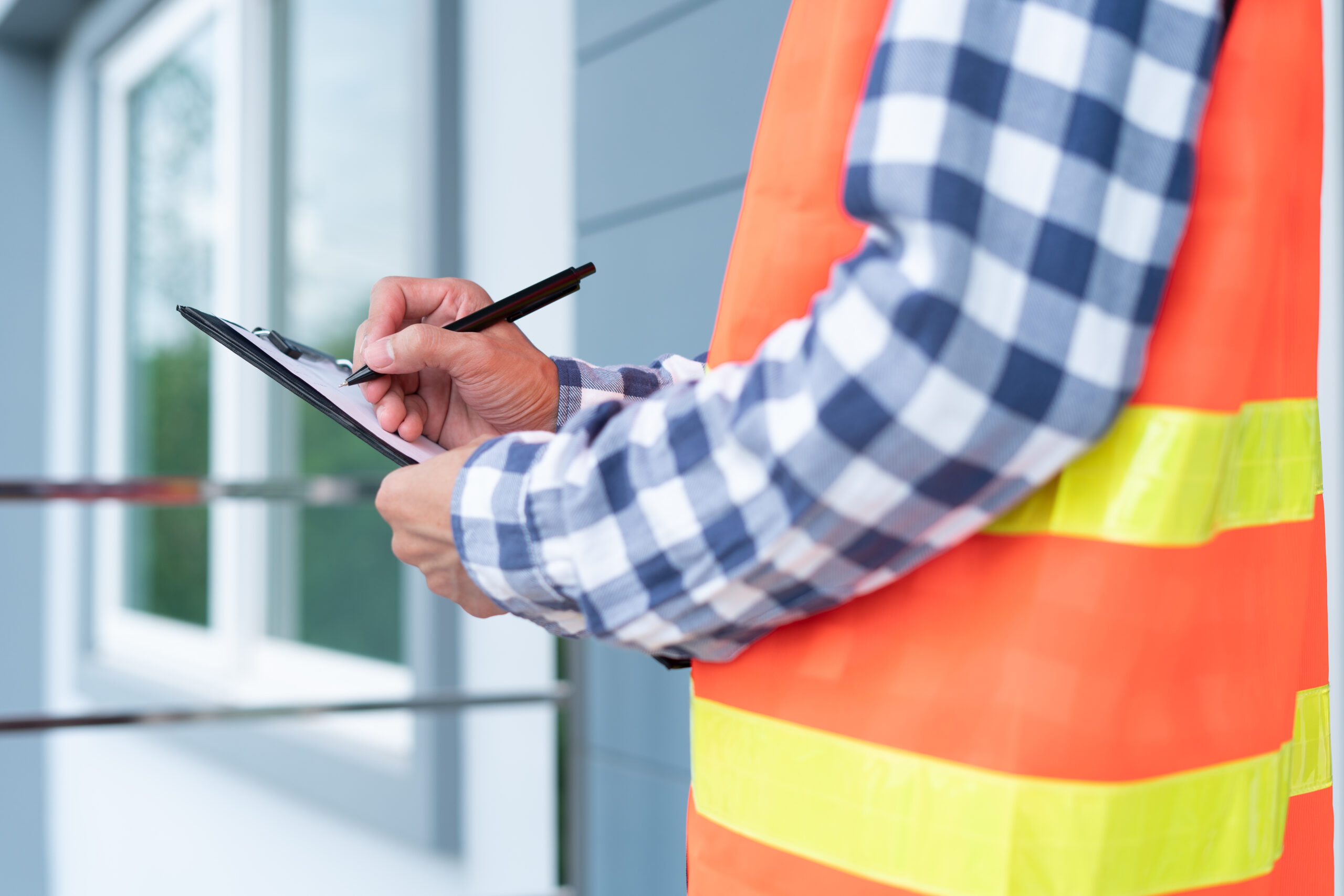 Inspector checking a roof and structure before an offer is made
